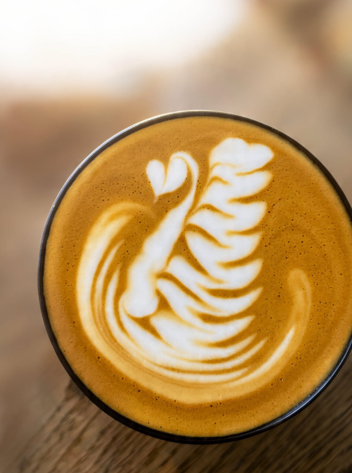 Kawa z latte artem w Happy People